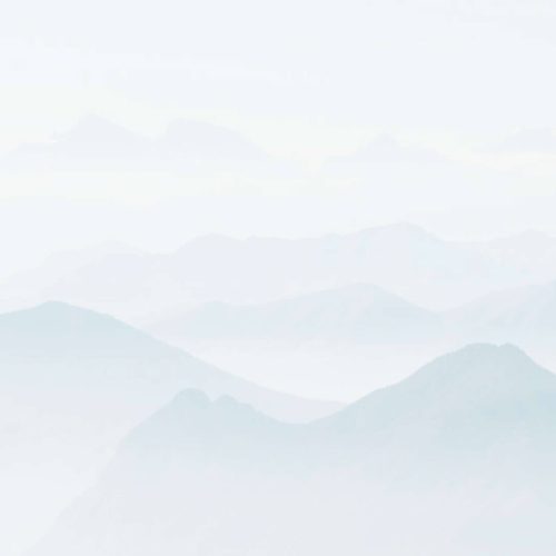 beautiful-shot-high-white-hilltops-mountains-covered-fog